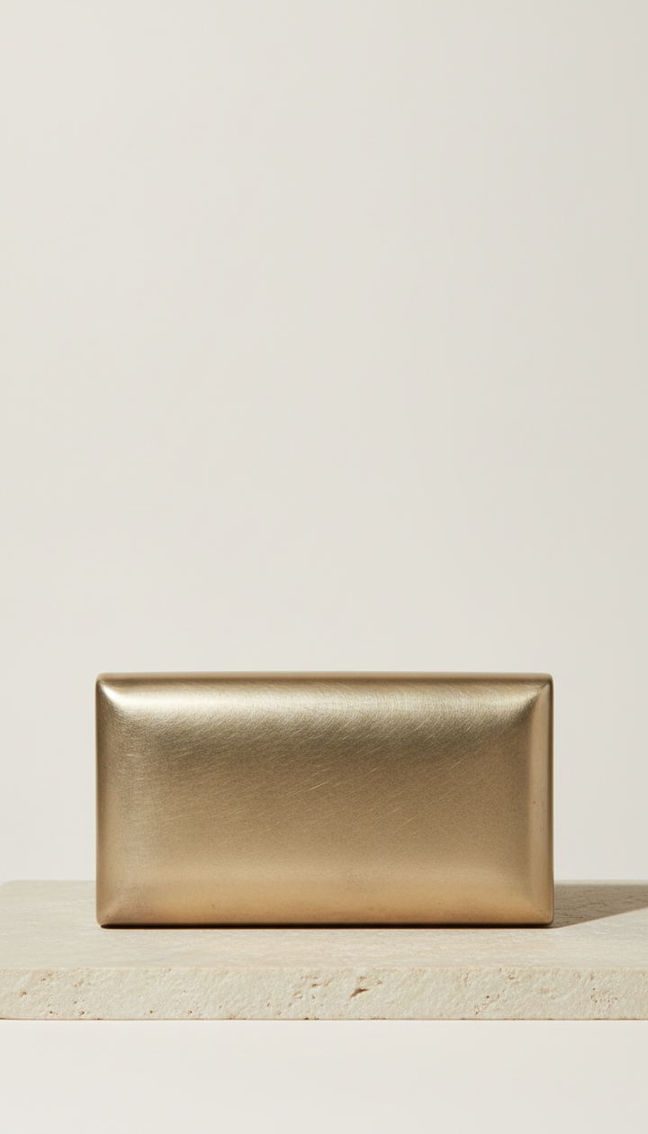 Brushed antique gold clutch bag, Default angle: 3/4 view for jewellery and accessories to articulate sculptural form and...